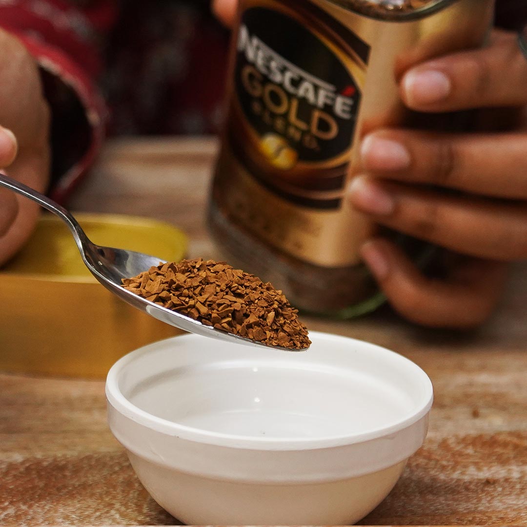 Make an intense coffee mixture with some lukewarm water and 2 tablespoons of Nescafe Gold
